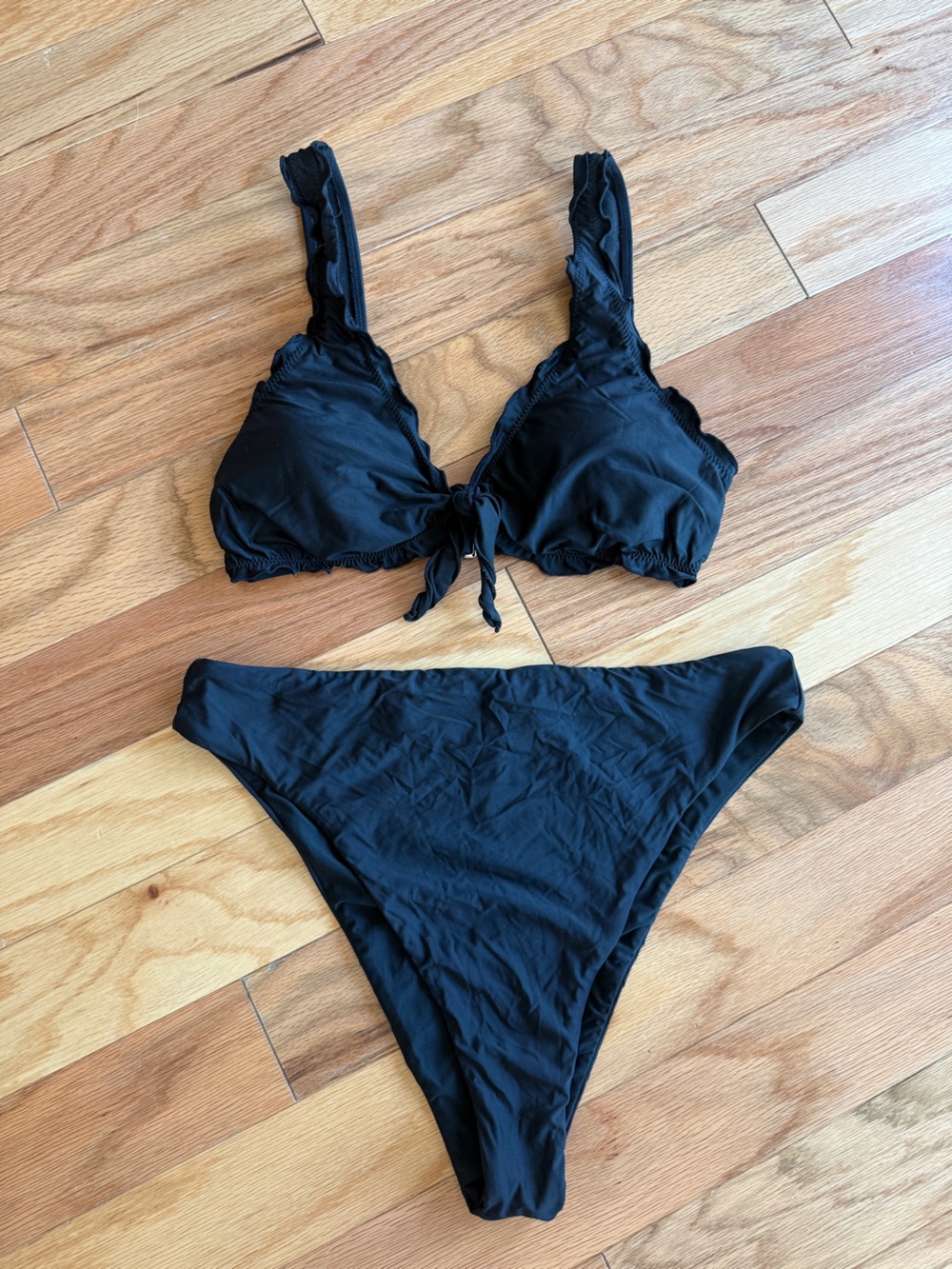 Black bikini ruffled top and cheeky bottoms